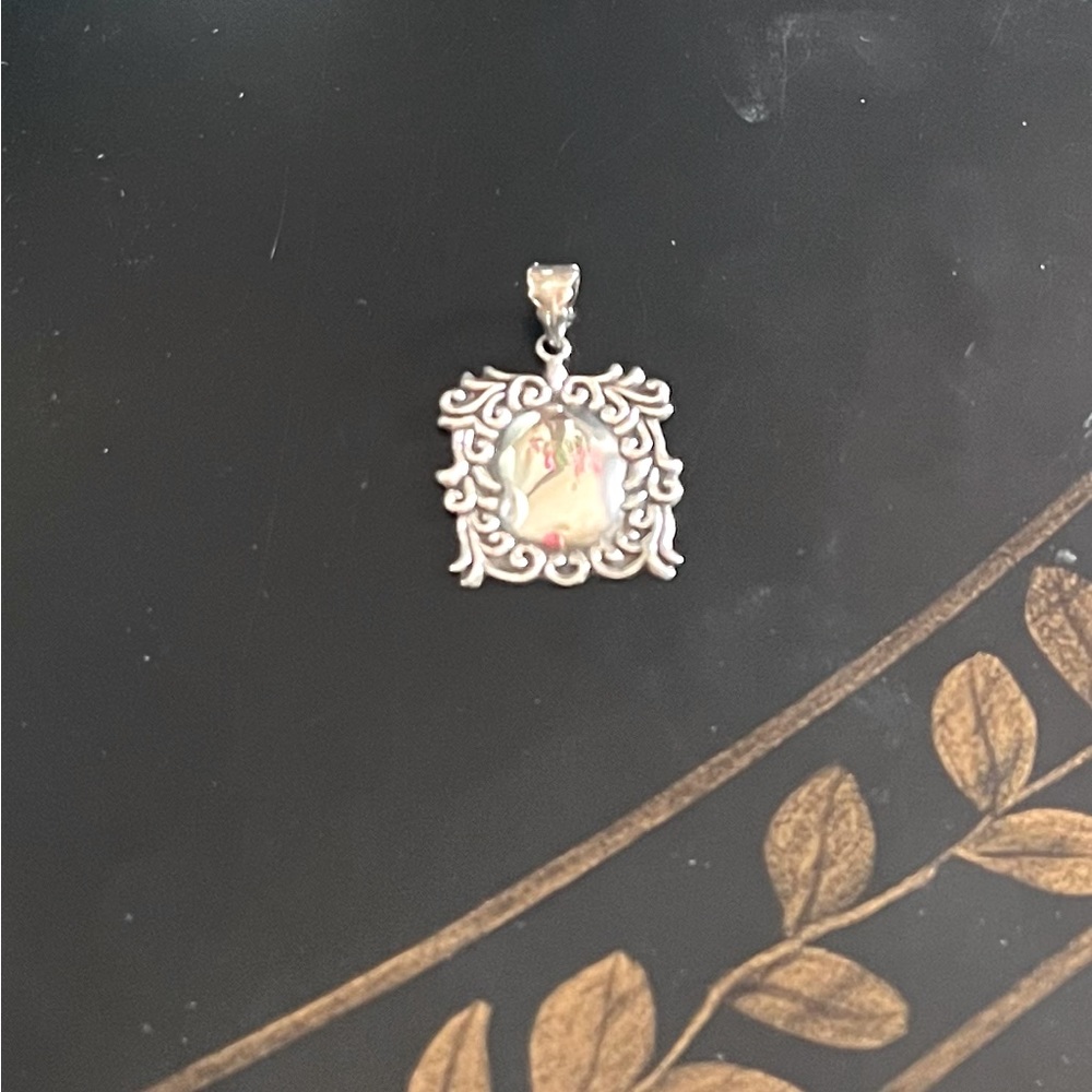 Square Sterling pendant with scroll design,